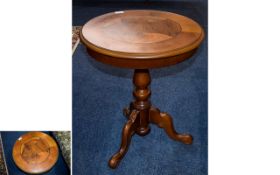 Occasional Table A small circular occasional table with trefoil legs and turned column.