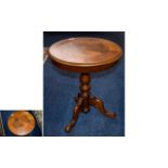 Occasional Table A small circular occasional table with trefoil legs and turned column.