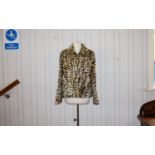 Ocelot Jacket Vintage short boxy fur jacket with small, velvet backed round collar, front patch