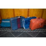 A Collection Of Luggage Bags 4 in total including an orange Samsonite suitcase, blue Lark suitcase,