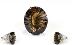 A Ladies large And Unusual Brazilian Smoky Quartz And Silver Statement Ring 50ct oval solitaire in