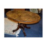 Walnut Tile Top Table, Oval Top with Inlay, Quadrafoil Base on Ceramic Castors. 46 Inches wide &
