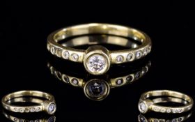 18ct Gold Set Diamond Ring, Set with a Central Diamond Flanked by 5 Diamonds to Each Shoulder.
