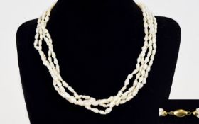 Ladies - Nice Quality 4 Strand Cultured Pearl Necklace with a Fine 18ct Gold Clasp. Fully Marked for