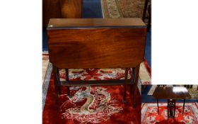 A Small Sutherland Table Dark wood drop leaf table of plain form, height 26 inches,