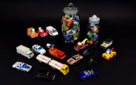 A Collection Of Playworn Cars And A Variety Of Glass Marbles Comprising two traditional sweet jars