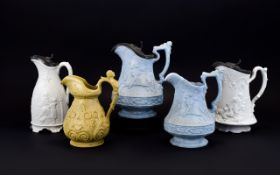 A Good Collection of Early to Mid 19th Century Moulded Jugs / Pitchers.