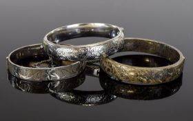 Three Various Silver Hinged Bangles, each with etched designs to front; two similar but different