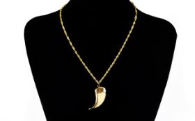 9ct Gold Chain Together With A Gold Mounted Talon Pendant,