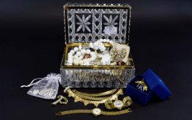 A Cut Glass Jewellery Box Containing A Mixed Collection Of Costume Jewellery To include boxed