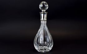 A Modern and Stylish Good Quality Silver Collared Cut Crystal Decanter. Hallmark Sheffield 2001.