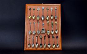 A collection Of Decorative Teaspoons, 26