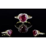 Ruby Solitaire and Natural White Zircon Heart Shape Ring, a 5ct heart cut ruby, of rich red colour,