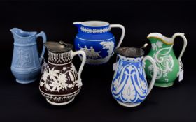 A Good Collection of Hand Painted Mid 19th Century Jugs. Various Factories.