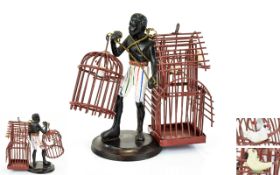 A Vintage - Cold Painted Bronze Figure of a Bird Seller.