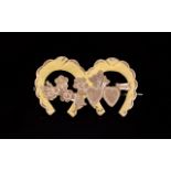 A Vintage 9ct Gold Sweetheart Brooch Small pin brooch in the form of two conjoined horseshoes with