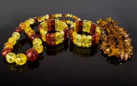 A Mixed Collection of Statement Necklaces And Bracelets to include faux amber graduating bead