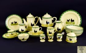 A Collection German 'Teller Keramik' Serveware 'Hahn und Henne' Including Jugs, Dinner Bowls, Cups,