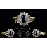 9ct Gold Set Diamond and Sapphire Cluster Ring. Flowerhead Setting.