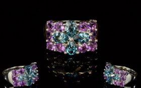 Ladies Swiss Blue Topaz And Amethyst Silver Set Ring Dress ring set with 10 small faceted circular