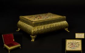 A Vintage Swiss Musical Jewellery Box Small brass tone footed jewellery box with tapestry design