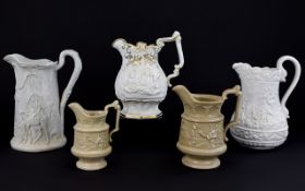 Five Various Moulded Jugs With Exotic Scenes comprising an Alcock white jug showing a camel and