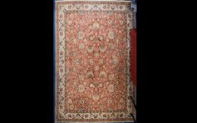 A Large Woven Wool Blend Rug Large rug with cream cotton fringing,