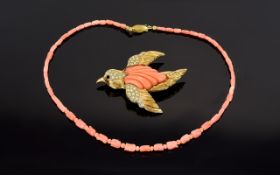 A Vintage Coral Set Statement Brooch And Coral Bead Necklace Large gold tone brooch in the form of