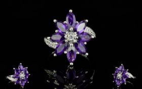 Amethyst Flower Cluster Ring, marquise cut deep purple amethysts, totalling 4cts,