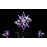 Amethyst Flower Cluster Ring, marquise cut deep purple amethysts, totalling 4cts,