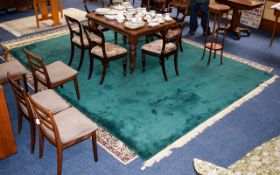 A Large And Impressive Heavyweight Woven Wool Rug Large emerald green rug with bamboo leaf intarsia