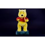 Dancing and Singing Winnie The Pooh Figure. 16.5 inches in height.