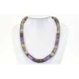 Anne Farag Amethyst and Silver Necklace, artisan designer necklace of tubular and rondelle