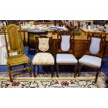 A Collection Of Four Dining Chairs To include two carved back dining chairs with blue jacquard