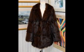 Ladies Dark Brown Mink Jacket, fully lined with slit pockets,