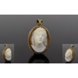 9ct Gold Mounted Oval Shaped Cameo with Portrait Bust of a Young Victorian Lady. Marked 9ct. 1.