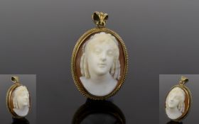 9ct Gold Mounted Oval Shaped Cameo with Portrait Bust of a Young Victorian Lady. Marked 9ct. 1.