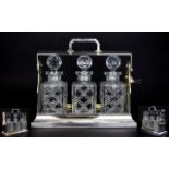 Edwardian Silver Plated Tantalus Containing 3 ( Three ) Cut Glass Decanters,