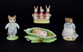 A Collection Of Four Beatrix Potter Figures comprising of Royal Albert "Tom Kitten",3.