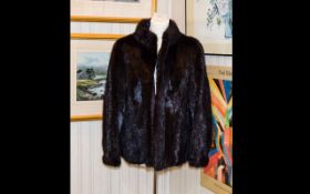 Ladies Black Short Mink Jacket with slit pockets and Raglan Sleeves.