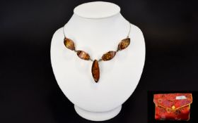 A Contemporary Amber And Silver Five Stone Necklace 18 inch necklace on fine silver chain comprising