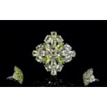 Ladies Silver And Changbal Peridot Ring Statement ring set with 23 faceted Changbal Peridot, the