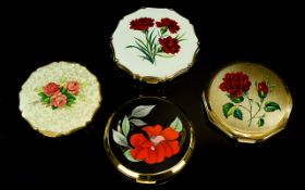 A Small Collection Of Vintage Stratton Compacts Four in total, each with a floral theme.