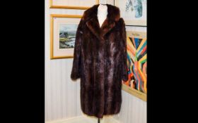 Ladies Dark Brown Three Quarter Length Mink Coat with rever collar, raglan sleeves.