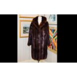 Ladies Dark Brown Three Quarter Length Mink Coat with rever collar, raglan sleeves.