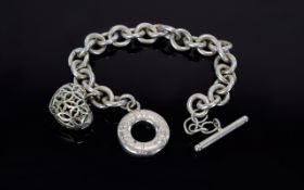 A Silver Bracelet Marked Tiffany & Co. 8 Inches In length.
