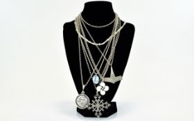 A Collection Of Mixed Silver And Metal Necklaces A varied collection of six necklaces to include