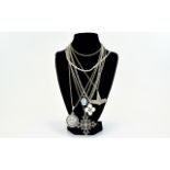 A Collection Of Mixed Silver And Metal Necklaces A varied collection of six necklaces to include