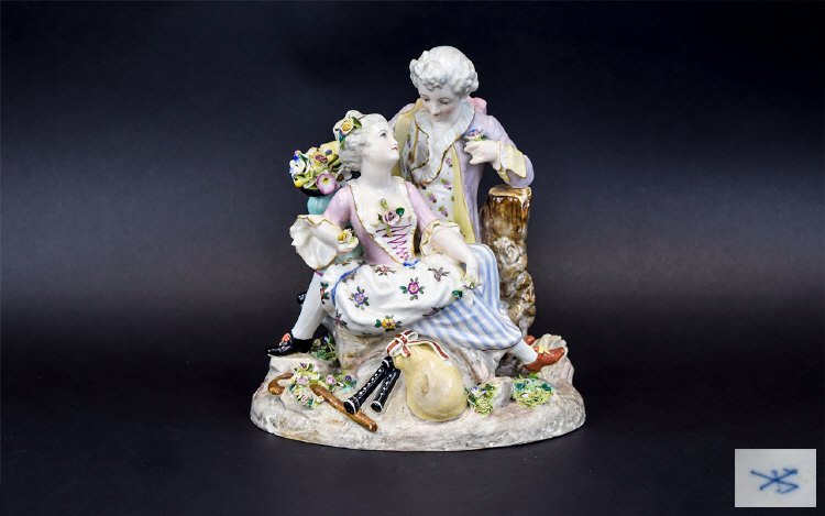 After Meissen Romantic Figure Group showing a young couple in 18thC dress, in a countryside setting,