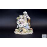 After Meissen Romantic Figure Group showing a young couple in 18thC dress, in a countryside setting,